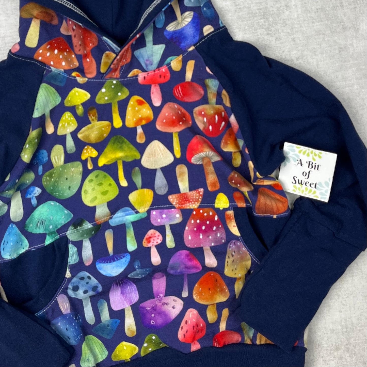 Rainbow Mushrooms Grow with Me Pocket Hoodie