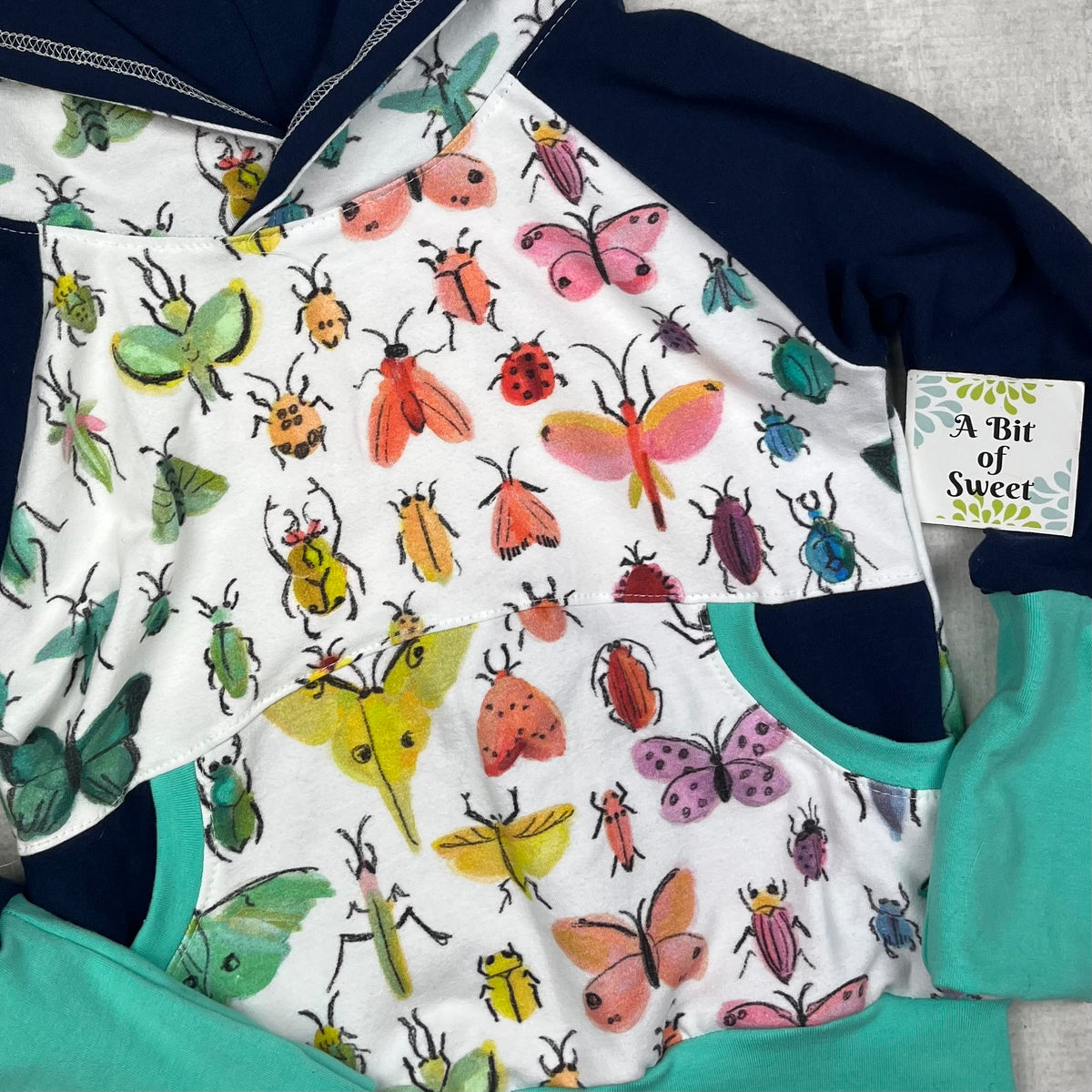 Watercolor Bugs Grow with Me Pocket Hoodie