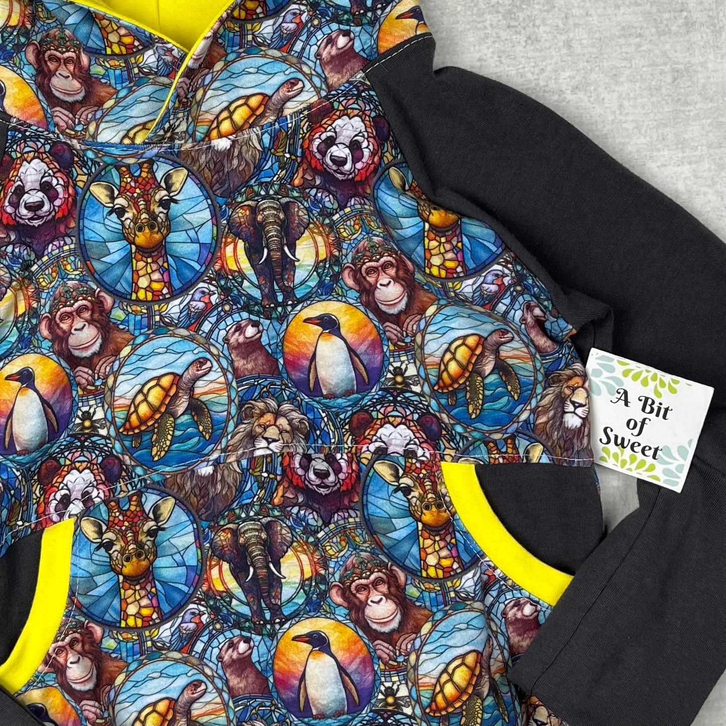 Stained Glass Creatures Grow with Me Pocket Hoodie